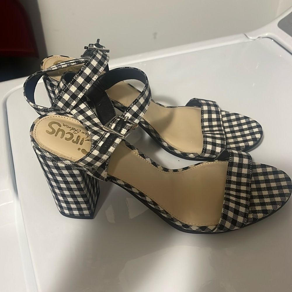Circus black and white checked sandals.